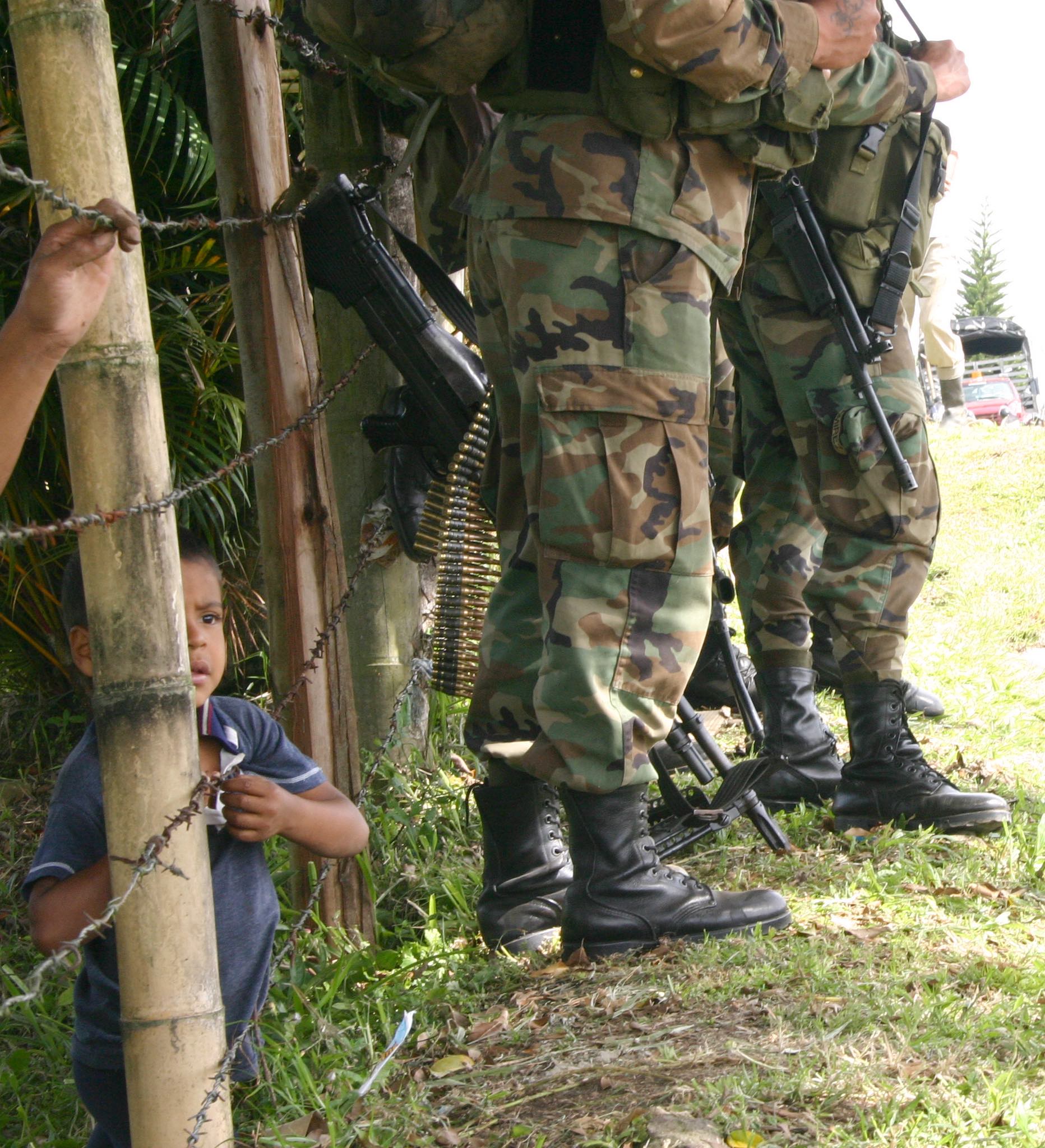 Colombian child and soldiers