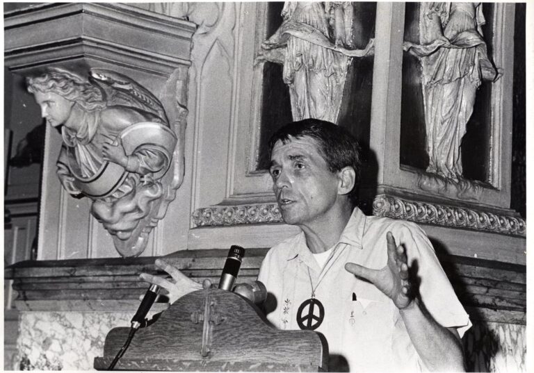 Daniel Berrigan preaching